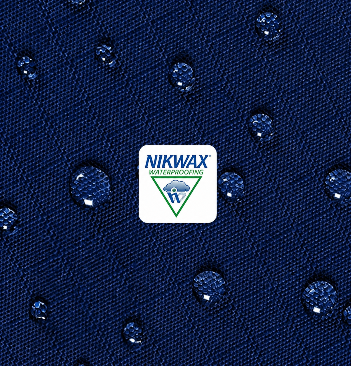 Water beading on navy waterproof fabric with a Nikwax badge